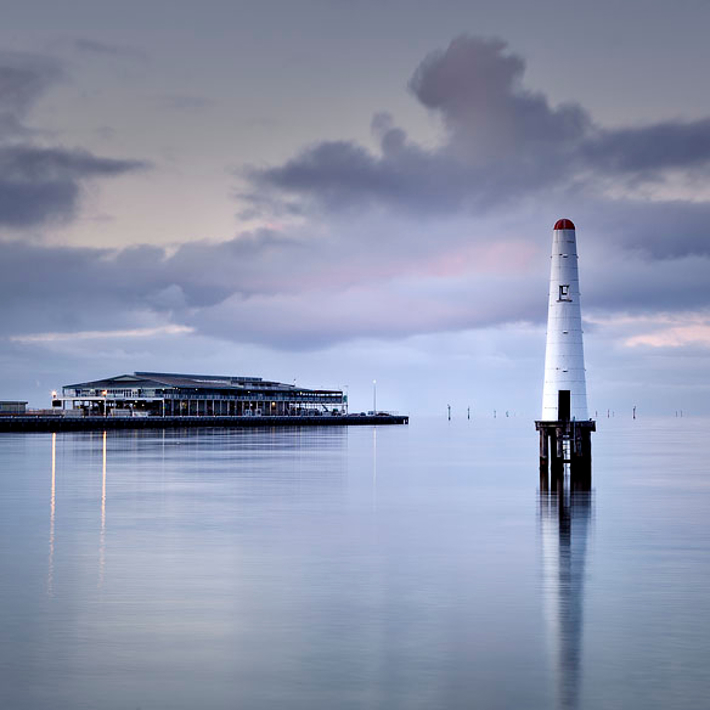 Still water surrounding the lighthouse at Beacon Cove
